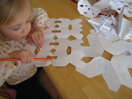 lucy coloring snowflakes