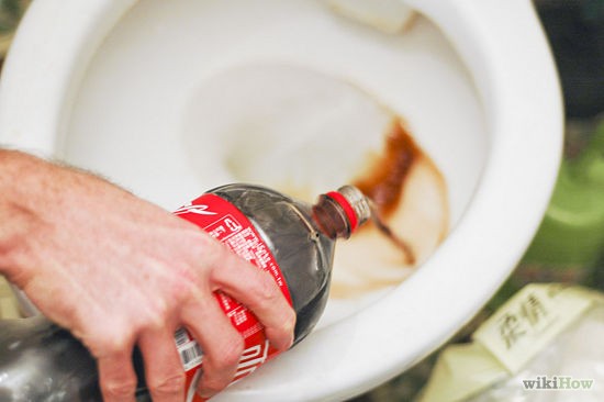 Cleaning a Toilet With Cola