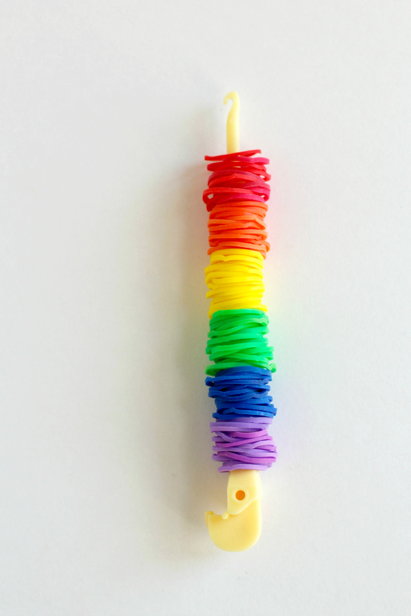 Add Loom Bands to a Rainbow Loom Hook for Pom Pom Pencil Toppers