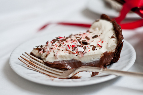 Creamy Peppermint Bark Tart Slice on Plate