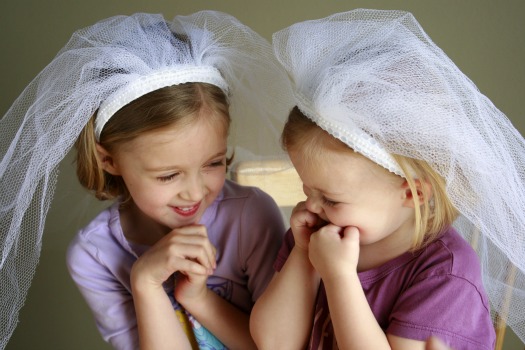 My girls are having fun with their new dress up wedding veils