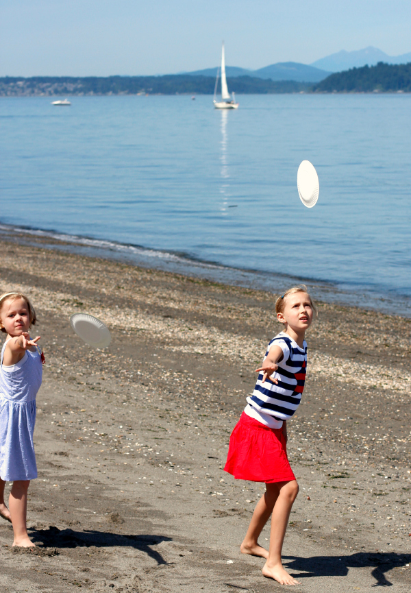 Flying Watercolor Watermelon Frisbees at the Beach