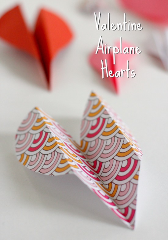 Folding Heart Airplane Valentine Crafts for kids @makeandtakes.com