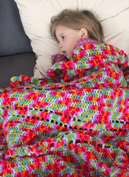 Kids Cuddling in Crochet Afghans