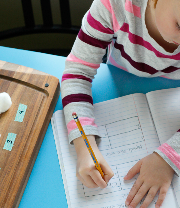 Kids Writing Findings in a Science Journal