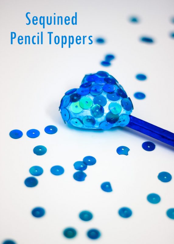 A simple, tutorial to make Sequined Styrofoam Heart Pencil Toppers. A great kid craft for Valentine's day and beyond! Guest post by ArtsyCraftsyMom for Makeandtakes.com