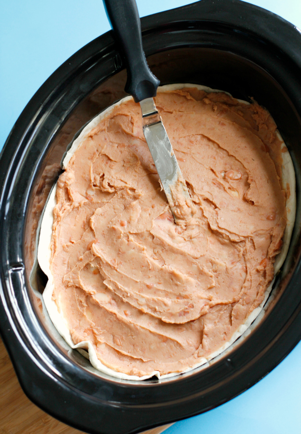 Spreading Refried Beans with a Cake Decorating Spatula