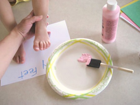 Stamping Feet in Paint