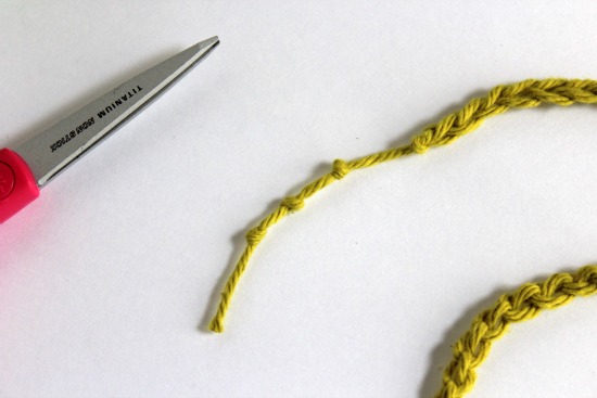 Tying Knots in the Crochet Snake Tail