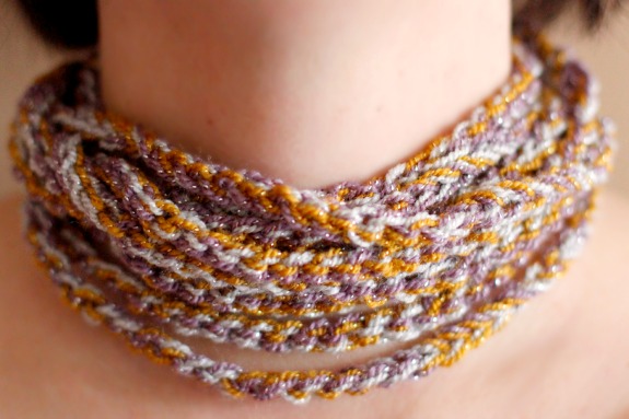 Wearing a Crochet Chain Stitch Necklace @makeandtakes.com #crochetaday