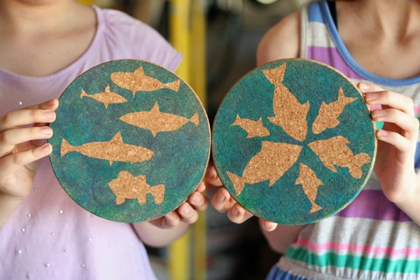 Jumbo coasters with airbrushed fish silhouettes