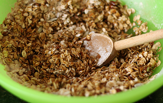 Mixing Gingerbread Granola Recipe @makeandtakes.com