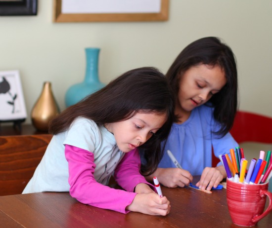 girls coloring sticks