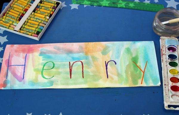 Painting over oil pastel name writing