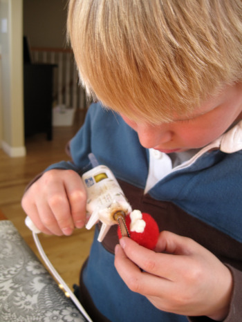 Gluing Pom Pom Birds