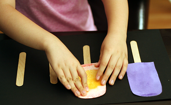 Glue craft sticks and painted popsicles