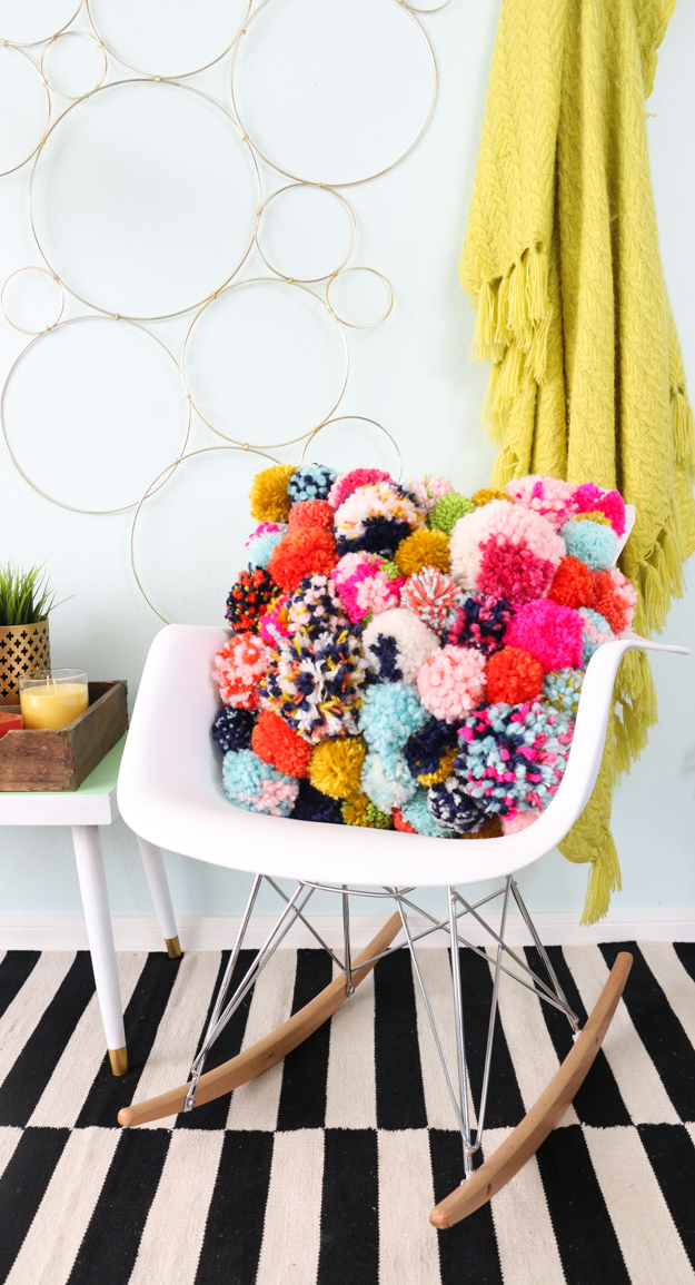 A Cozy Pom Pom Pillow