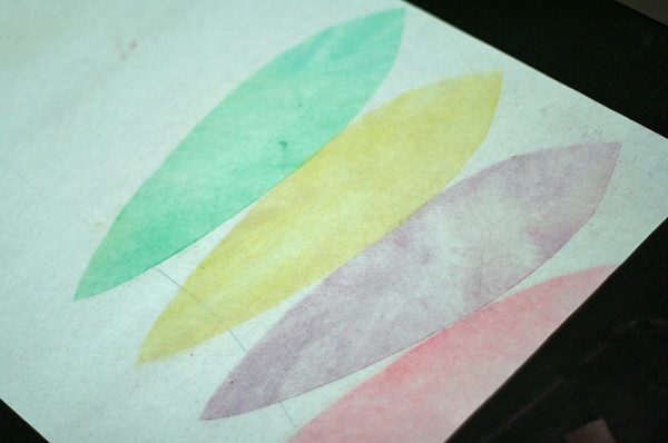 Chalk pastel stenciled feathers