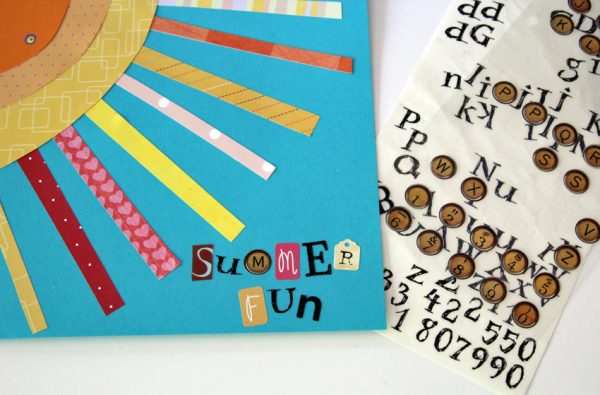 Journal cover with paper collage and letter stickers