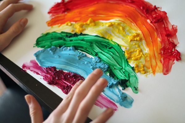 Painting with homemade textured finger paints