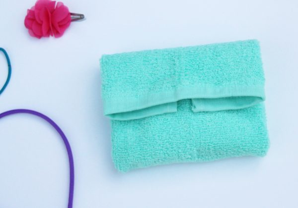 Craft a washcloth purse that holds a bar of soap