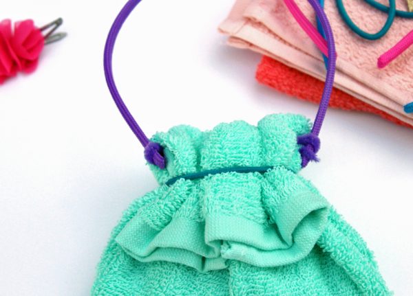 Washcloth purse with headband handle
