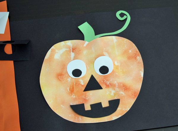 Watercolor and gauze painted jack o' lantern craft for kids