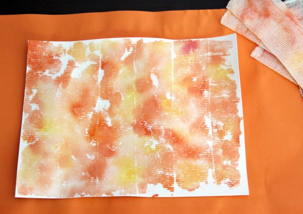Painted paper with watercolors and gauze