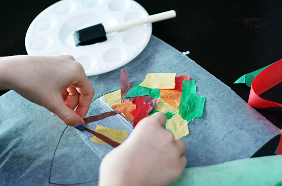 Gluing tissue paper to wax paper