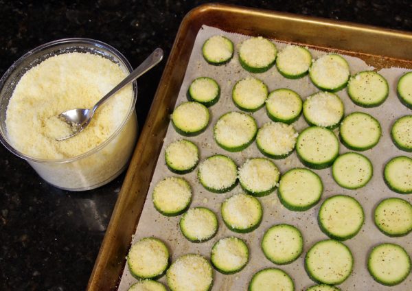 Cooking cheesy zucchini coins with kids