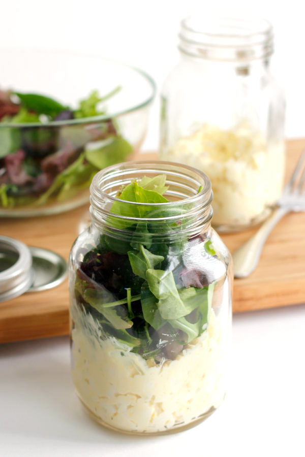 Adding Lettuce to Egg Salad in a Mason Jar