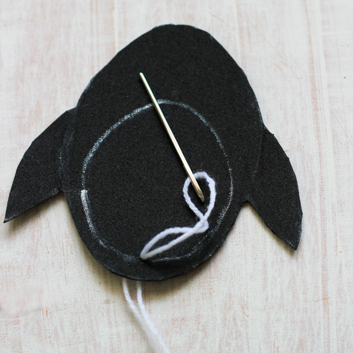 Yarn-Weaving-penguin-craft-lacing