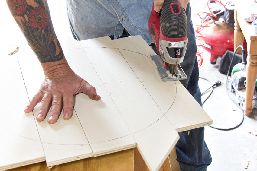 power tools cutting a wood circle