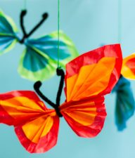 This Tissue Paper Butterfly Mobile Craft is a beautiful decoration for summer or spring. Fun to do with kids & just needs some tissue paper & pipe cleaners!