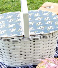 a diy picnic basket made from wood and an ordinary basket