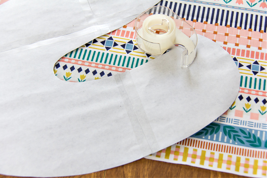 a letter s being taped together to make a fabric template