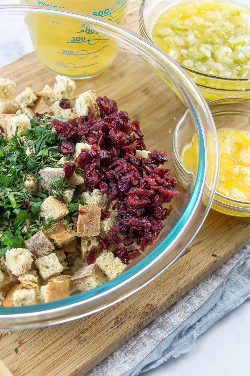 ingredients being prepared to make cranberry stuffing