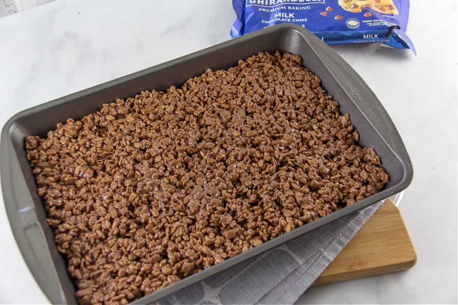 chocolate rice krispy mixture pressed into a baking pan