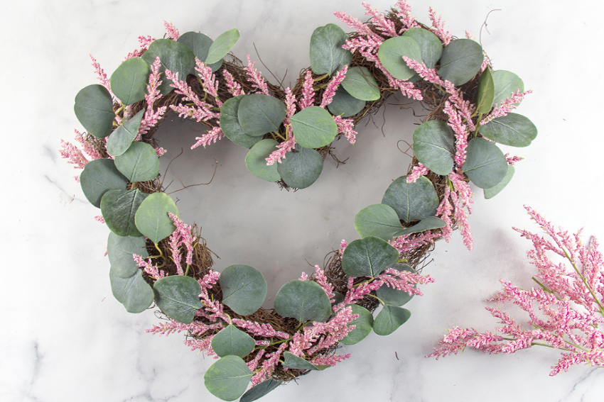 the making of a handmade valentines day pink wreath