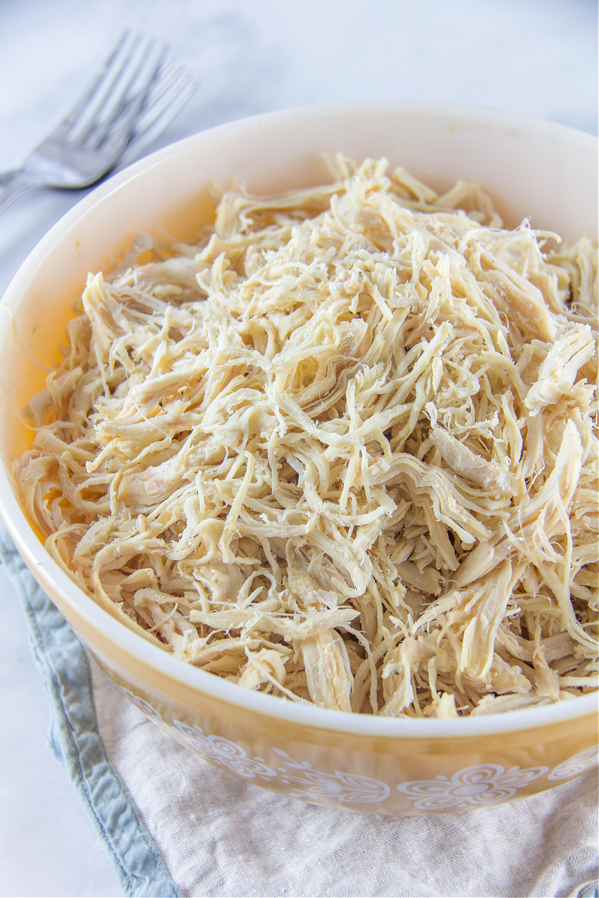 shredded chicken in a large bowl